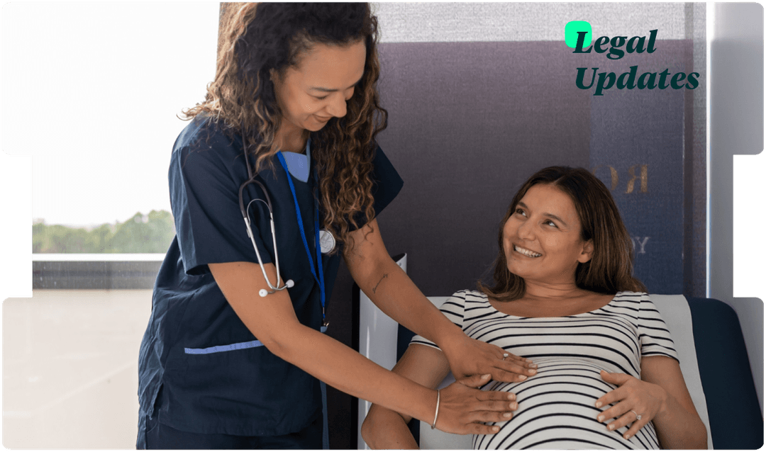 Midwife examines a smiling expectant mother, highlighting compassionate maternity care and key legal updates.