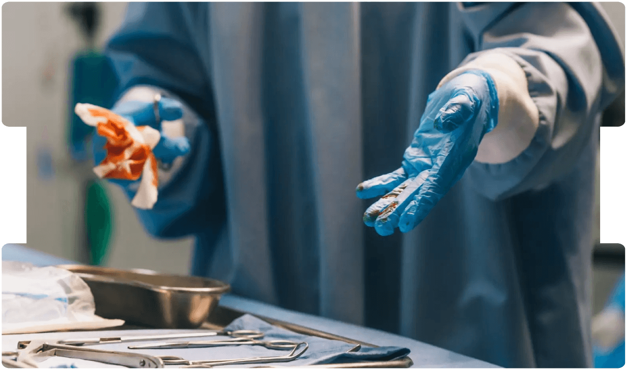 SEO Imagery INNEG said:  Surgeon in operating room handling surgical tools, representing the complex medico-legal dilemmas in brain cavernoma diagnosis and treatment.
