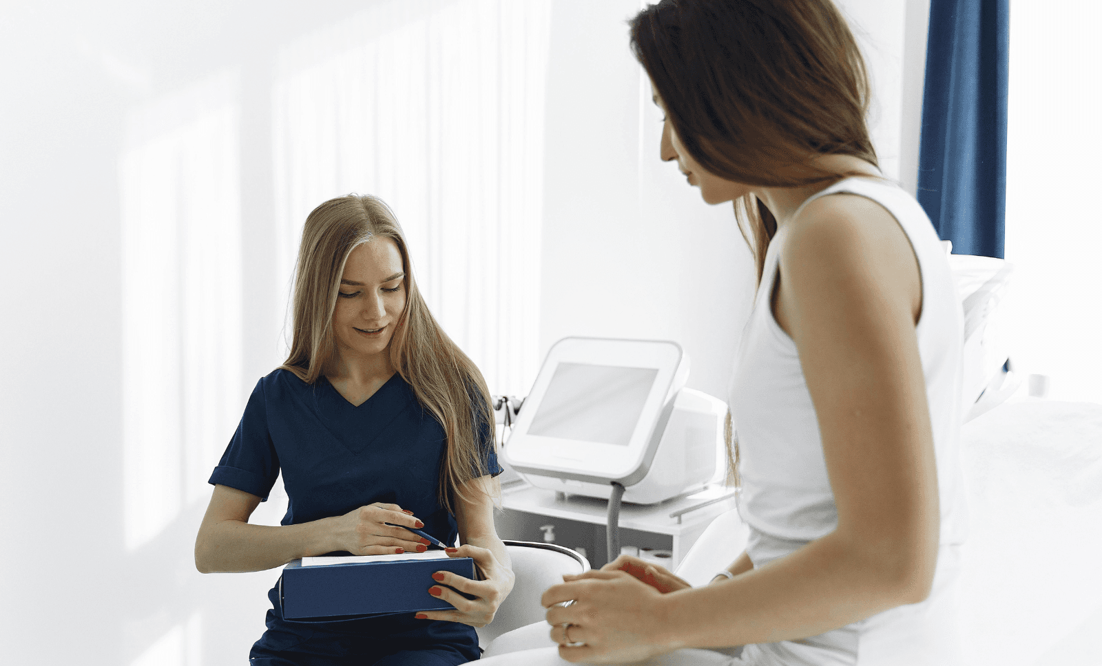 female-doctor-female-patient-breast-cancer