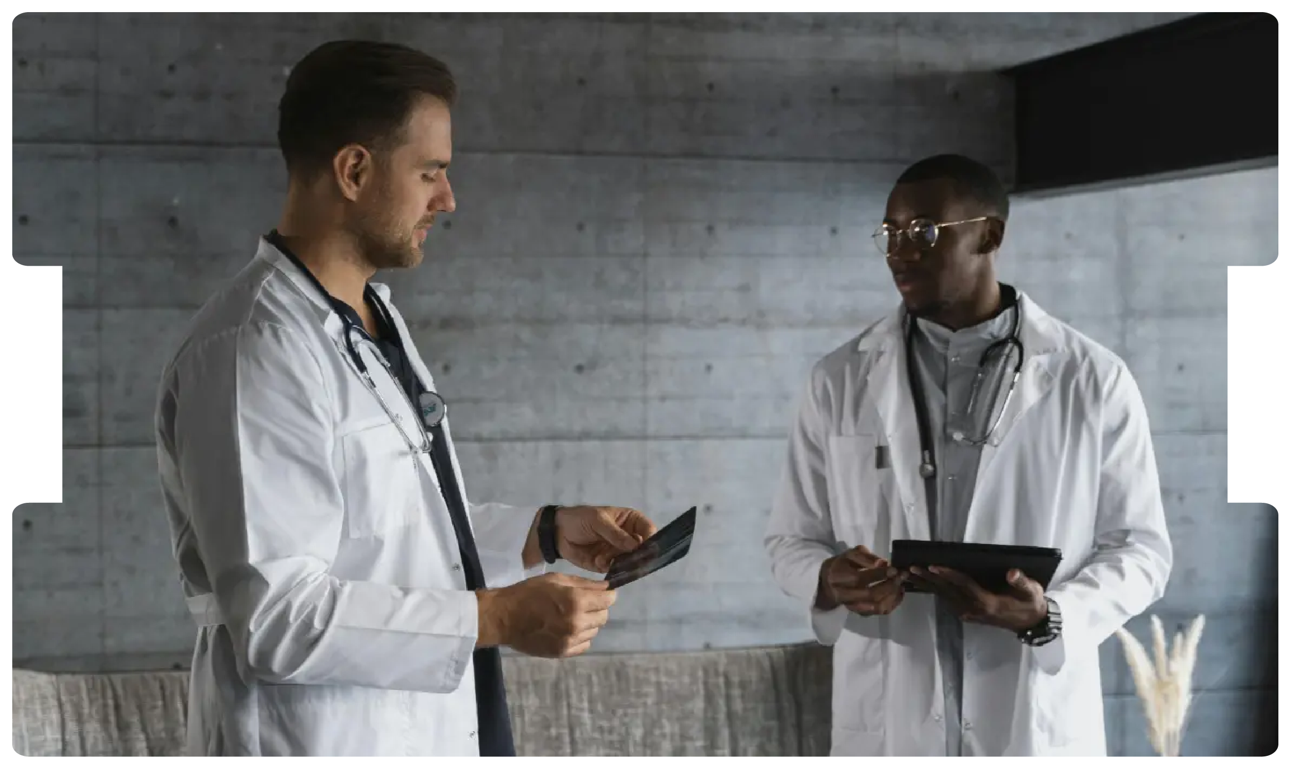 Two doctors reviewing medical images together, representing collaboration and the medico-legal complexities of colorectal cancer litigation.