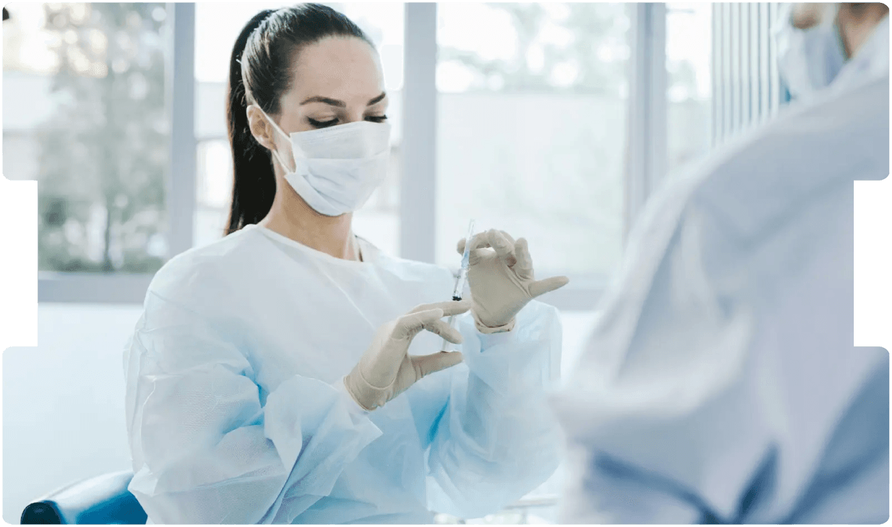 Medical professional preparing an injection, symbolising precision and reform amid discussions on fixed costs in clinical negligence cases.