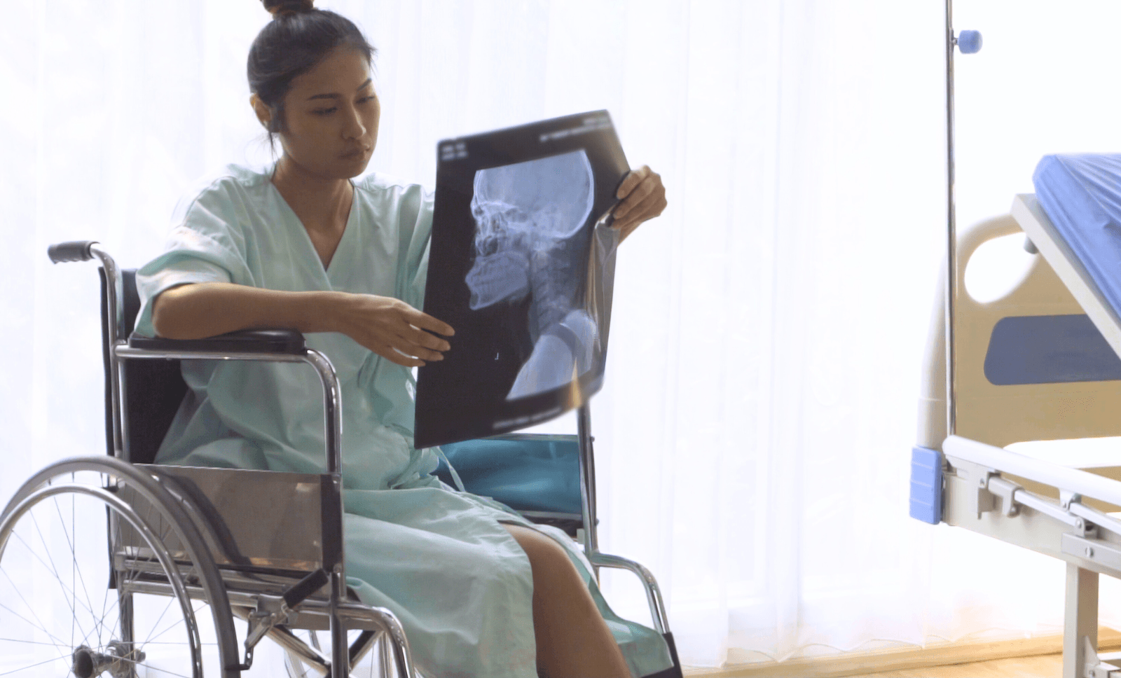 mTBI-INNEG-Litigation-wheelchair-scan