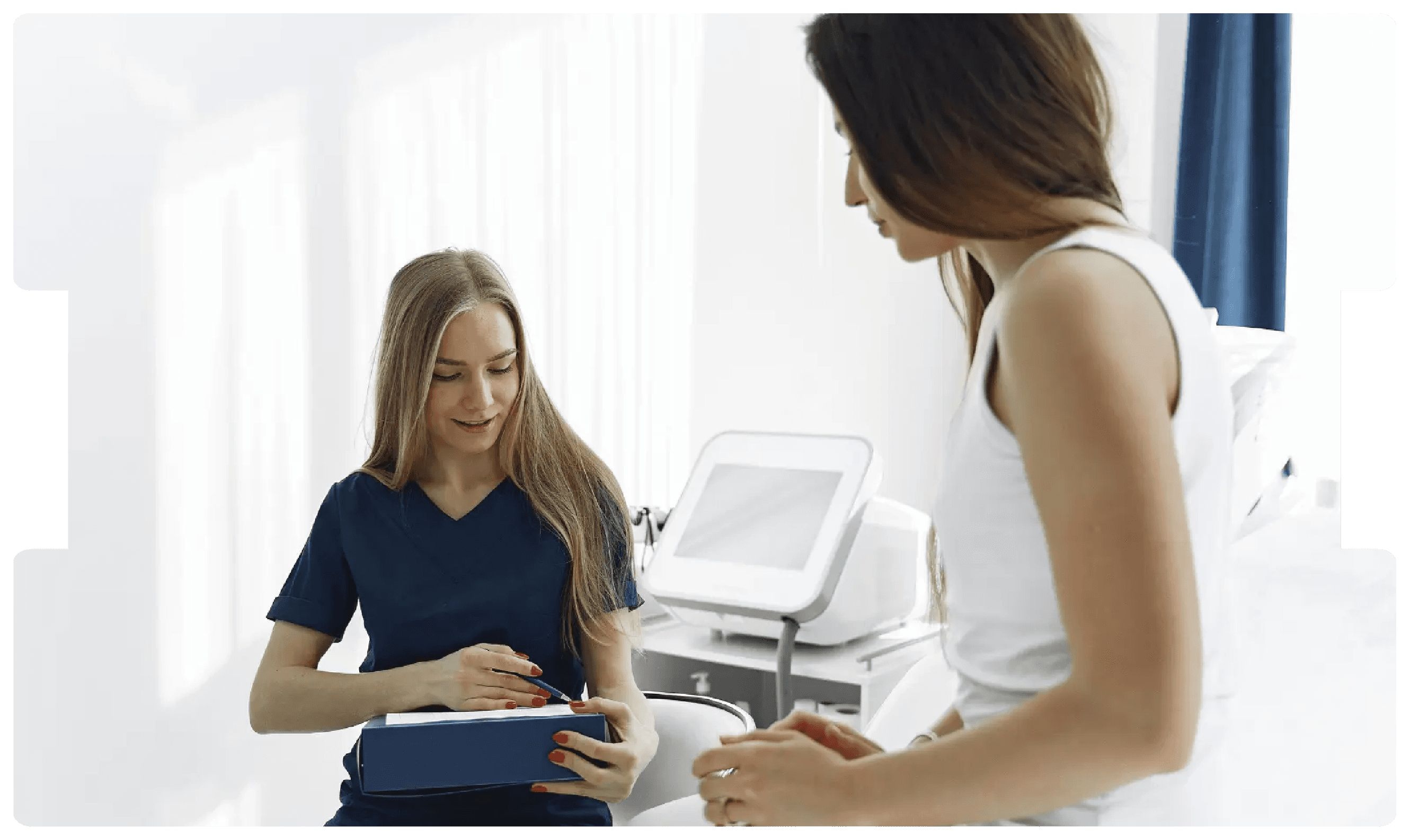 Healthcare professional consulting with a patient, promoting awareness and education around breast health, screening myths, and prevention.