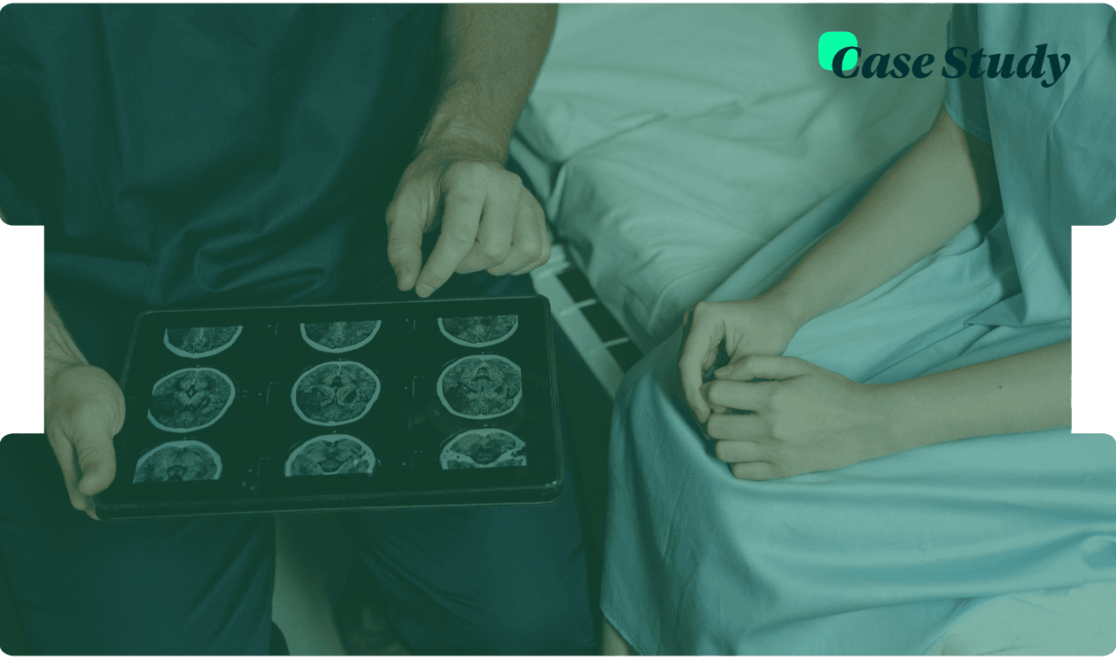 Doctor reviewing brain scan images on a tablet with a patient in a hospital setting