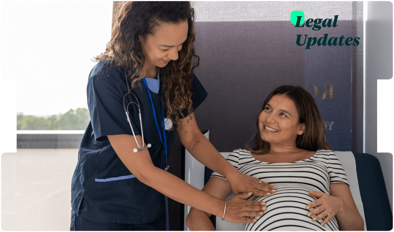 Midwife examines a smiling expectant mother, highlighting compassionate maternity care and key legal updates.