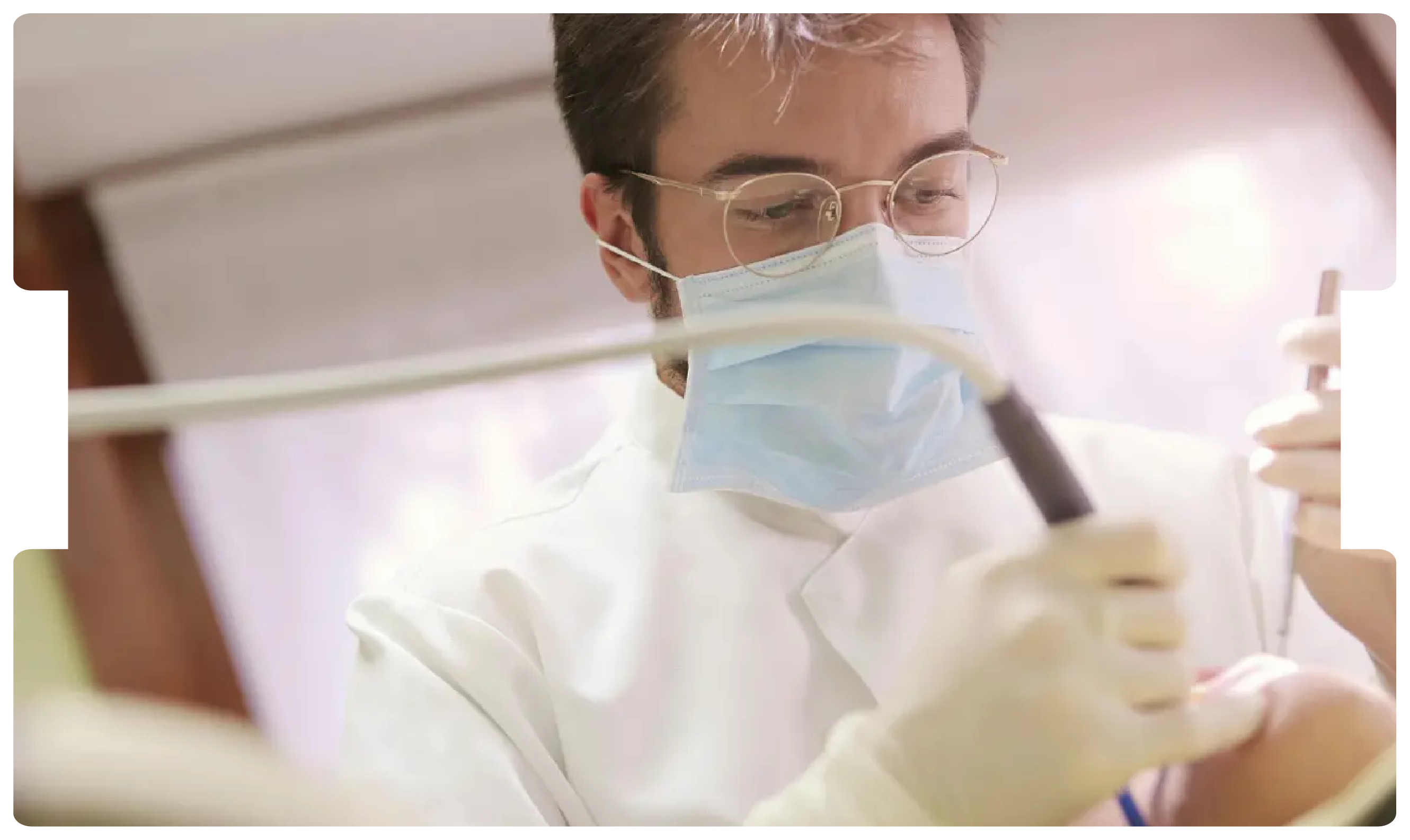 Dentist performing a procedure with precision tools, representing the expertise and guidance required when instructing a dental expert witness.