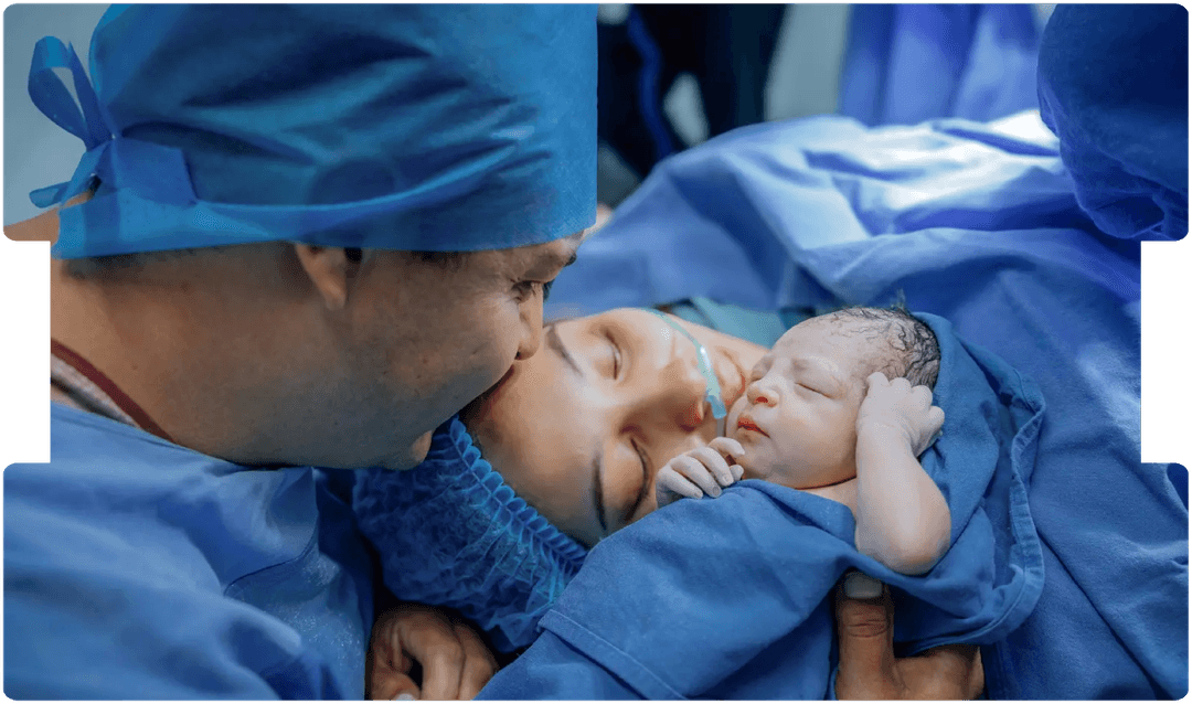 Mother holding her newborn in hospital, symbolising early bonding and awareness of Group B Streptococcal infection risks in newborns.