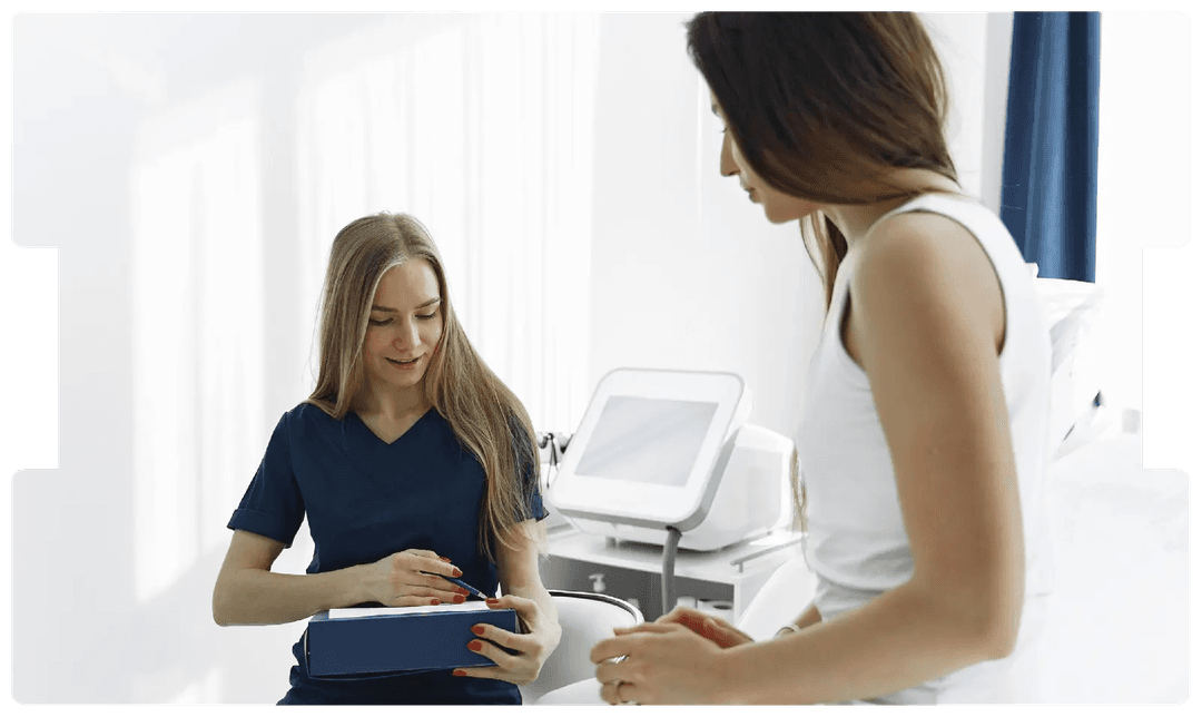 Healthcare professional consulting with a patient, promoting awareness and education around breast health, screening myths, and prevention.